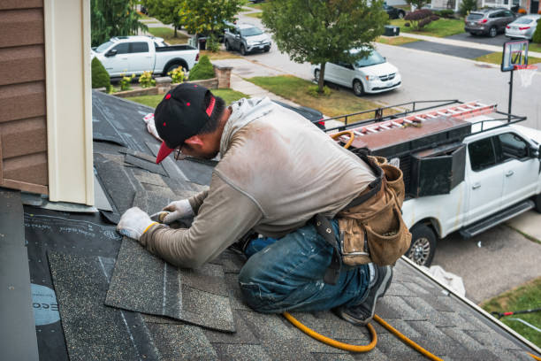 Professional Roofing technician working in Groveland, MA